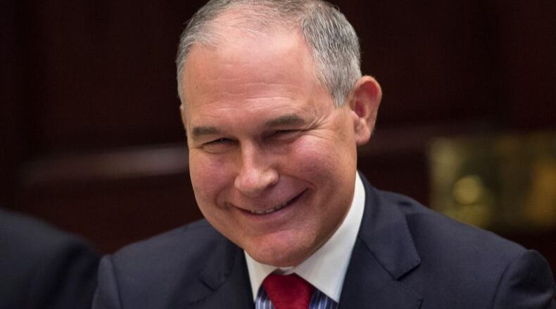 Environmental Protection Agency Administrator Scott Pruitt smiles while President Donald Trump leads an energy roundtable in the Roosevelt Room at the White House on June 28, 2017 in Washington, DC.