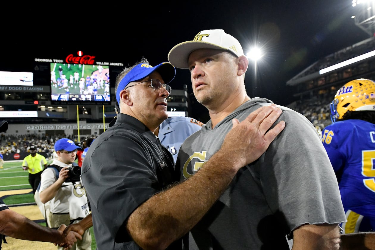 Pittsburgh head coach Pat Narduzzi (left) greets Georgia Tech head coach Brent Key after the Panthers beat the Yellow Jackets 42-28 on Saturday, Nov. 22, 2025, at Bobby Dodd Stadium in Atlanta. (Hyosub Shin/AJC)