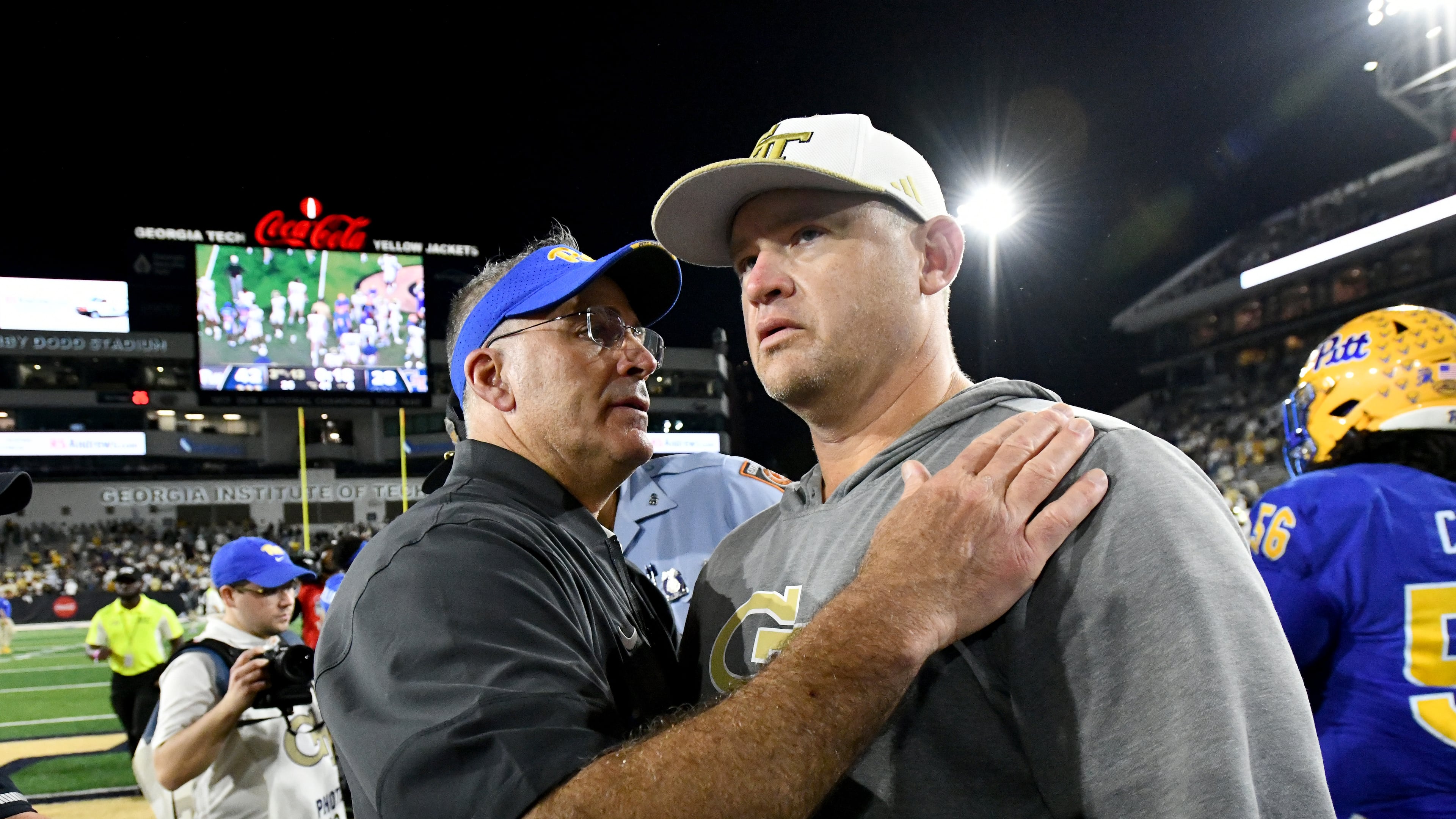 Pittsburgh head coach Pat Narduzzi (left) greets Georgia Tech head coach Brent Key after the Panthers beat the Yellow Jackets 42-28 on Saturday, Nov. 22, 2025, at Bobby Dodd Stadium in Atlanta. (Hyosub Shin/AJC)