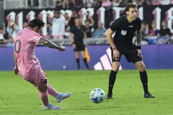 Inter Miami forward Lionel Messi (10) takes a free kick to score a goal during the first half of an MLS soccer match against Nashville SC, Saturday, July 12, 2025, in Fort Lauderdale, Fla. (AP Photo/Lynne Sladky)