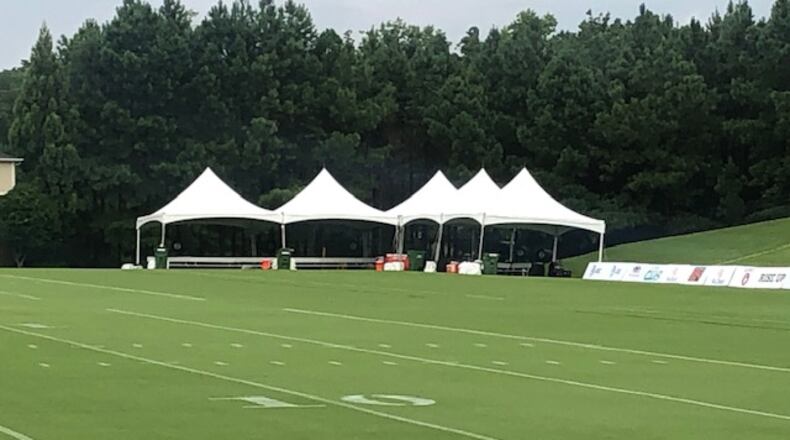 The fields are wet. We'll see if the Falcons decide to practice indoors. (By D. Orlando Ledbetter/dledbetter@ajc.com)