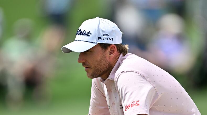 Russell Henley liines up putt on second green during first round of the Masters golf tournament, at Augusta National Golf Club, Thursday, April 10, 2025, in Augusta, Ga. (Hyosub Shin / AJC)