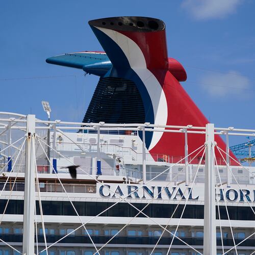 FILE - Carnival Cruise Line's Carnival Horizon cruise ship is shown docked at PortMiami, April 9, 2021, in Miami. (AP Photo/Wilfredo Lee, file)