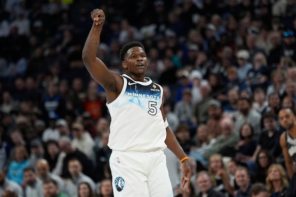 Minnesota Timberwolves guard Anthony Edwards looks on after missing a basket during the first half of an NBA basketball game against the Brooklyn Nets, Friday, April 11, 2025, in Minneapolis. (AP Photo/Abbie Parr)