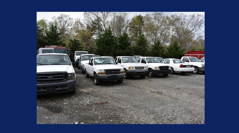 Surplus vehicles of Cherokee County and three cities will be auctioned May 12 in Canton. JEFF DOBSON & ASSOCIATES