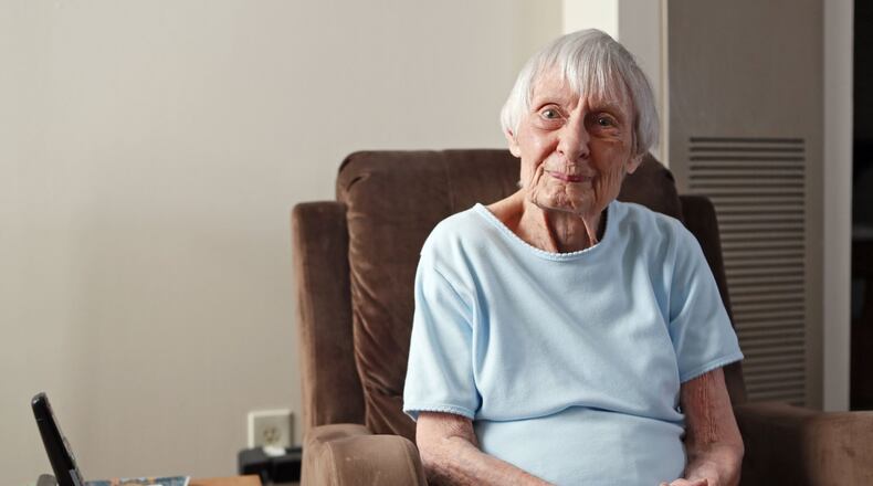 Janice Benario, photographed in her Decatur apartment, is a 95-year-old resident who served as a World War II WAVE working on part of the Enigma project. BOB ANDRES /BANDRES@AJC.COM