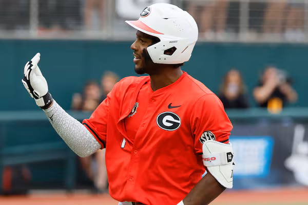 Georgia Bulldogs infielder Tre Phelps (1) gestures to the Liberty dugout after his two-run home run during the sixth inning of their NCAA Regional final game at Foley Field on Sunday, May 31, 2026, in Athens. Tre Phelps was later ejected for excessive celebration. (Miguel Martinez/AJC)