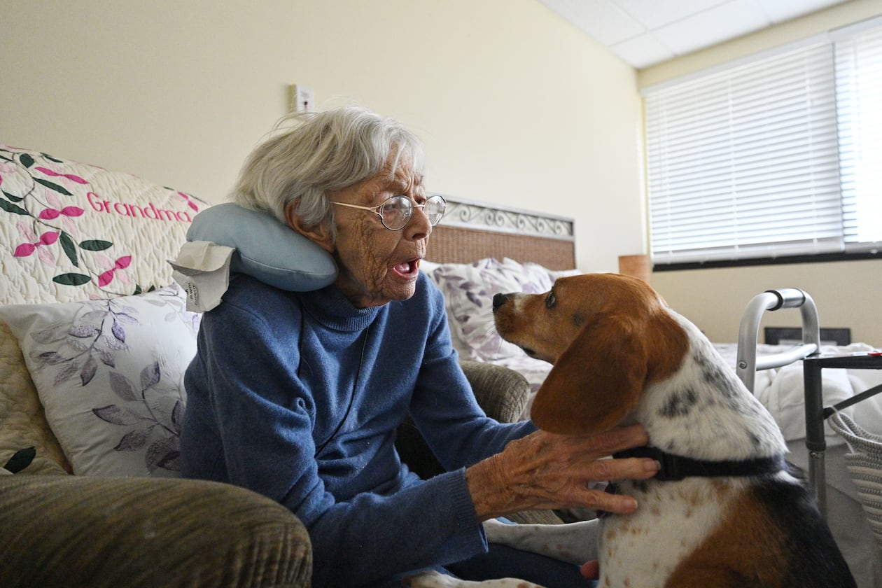 July 14, 2021 Smyrna - Rita Manatrizio plays with therapy dog Bella at her room at Woodland Ridge Assisted Living on Wednesday, July 14, 2021. (Hyosub Shin / Hyosub.Shin@ajc.com)