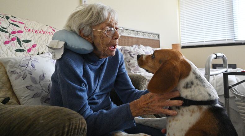 July 14, 2021 Smyrna - Rita Manatrizio plays with therapy dog Bella at her room at Woodland Ridge Assisted Living on Wednesday, July 14, 2021. (Hyosub Shin / Hyosub.Shin@ajc.com)