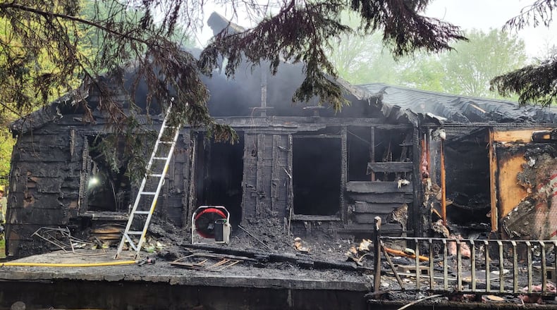 Gwinnett County officials have opened a child abuse investigation after a fire killed a 10-year-old girl. (Credit: Gwinnett County Fire and Emergency Services)