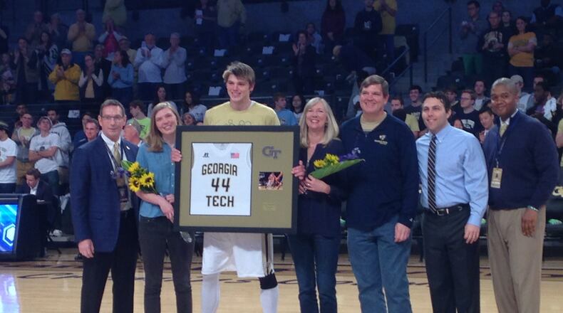 Former Georgia Tech center Ben Lammers with his family, athletic director Todd Stansbury, coach Josh Pastner and associate AD Marvin Lewis on senior day on March 3, 2018, at McCamish Pavilion. (AJC photo by Ken Sugiura)