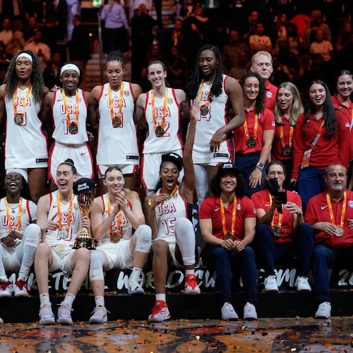United States team poses with medals after winning the Women's Basketball World Cup final match between the United States and France in Berlin, Sunday, Sept. 13, 2026. (AP Photo/Ebrahim Noroozi)