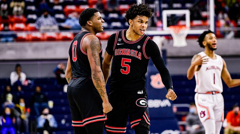 Jan 31, 2021; Auburn, AL, USA; Georgia Bulldogs guard K.D. Johnson (0) and guard Justin Kier (5) react during the game between Auburn and Georgia at Auburn Arena. Mandatory Credit: Todd Van Emst/AU Athletics