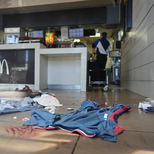 Blood stains are visible at the scene of what Israeli police say was a series of shooting attacks carried out by a Palestinian citizen of Israel in Kochav Yair, central Israel, Sunday, June 7, 2026. (AP Photo/Ariel Schalit)