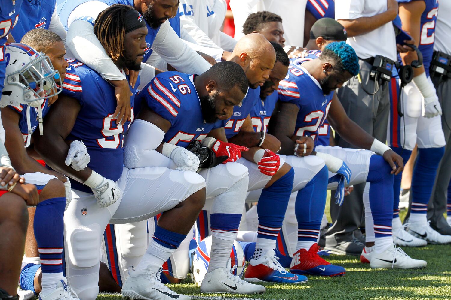 Photos: Falcons show solidarity during National Anthem