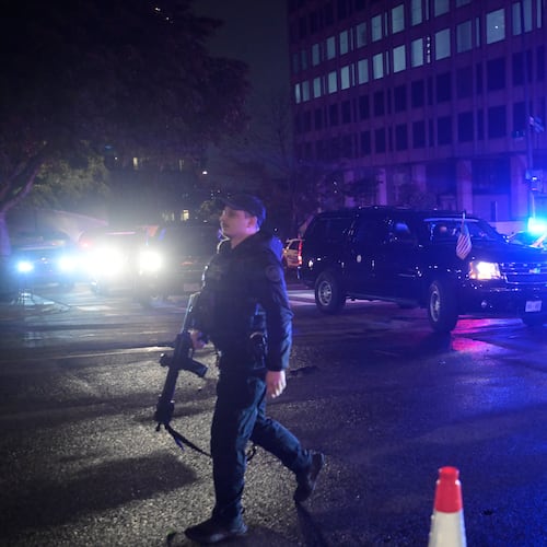 Law enforcement are seen outside the White House Correspondents Dinner, Saturday, April 25, 2026, in Washington. (AP Photo/Rod Lamkey, Jr.)