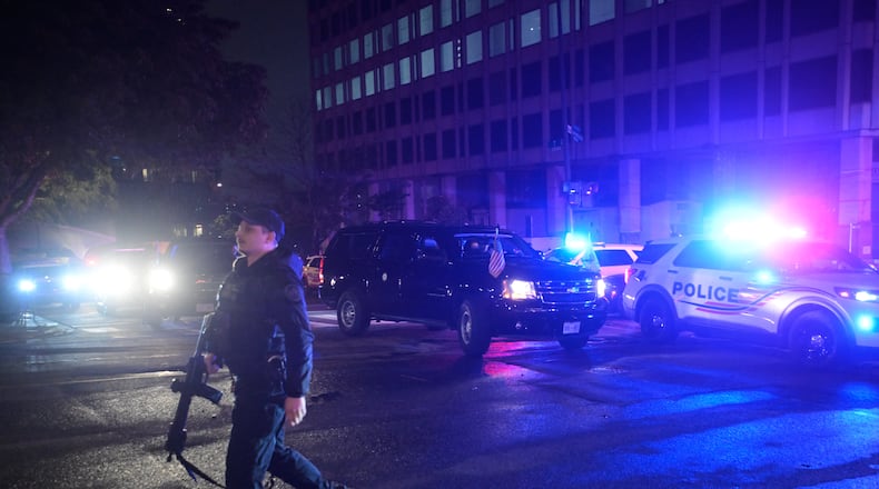 Law enforcement are seen outside the White House Correspondents Dinner, Saturday, April 25, 2026, in Washington. (AP Photo/Rod Lamkey, Jr.)