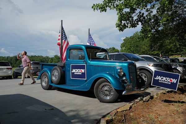 A vintage truck sports signs for Republican nominee for governor Rick Jackson before the first rally of his general election campaign at Meadows at Mossy Creek in Cleveland on Thursday. (Arvin Temkar/AJC)