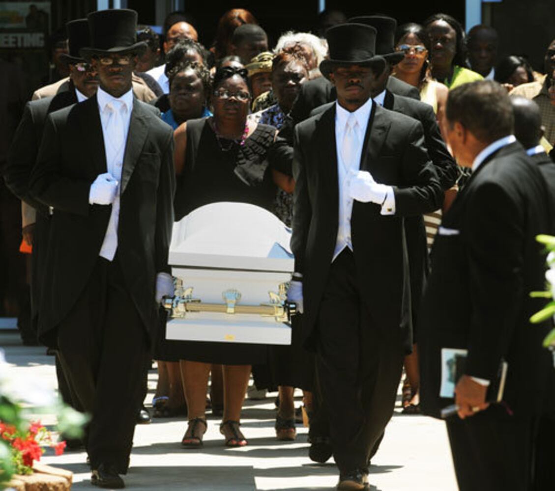 Mourners attend the funeral of Jazmin Green