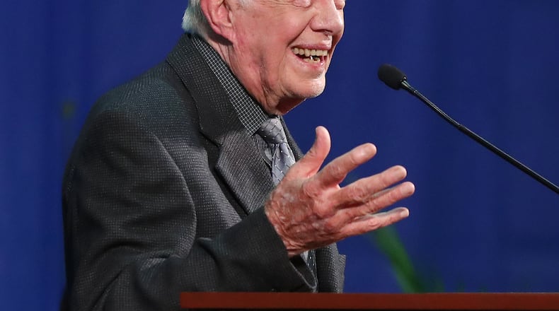 September 14, 2016 ATLANTA: President Jimmy Carter, who just had his three month MRI and a clean bill of health, shares a laugh as he conducts his annual Town Hall with Emory University freshmen at the Woodruff P.E. Center on Wednesday, Sept. 14, 2016, in Atlanta. The former president, who’ll turn 92 in two weeks, answers just about anything the students want to know during a Q & A session. Carter jokingly told students they may want to abstain from the election, but then recommended voting Democratic. Curtis Compton /ccompton@ajc.com