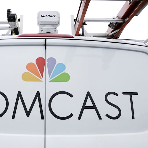 FILE- A Comcast truck is shown on Jan. 24, 2019, in Pittsburgh. (AP Photo/Gene J. Puskar, File)