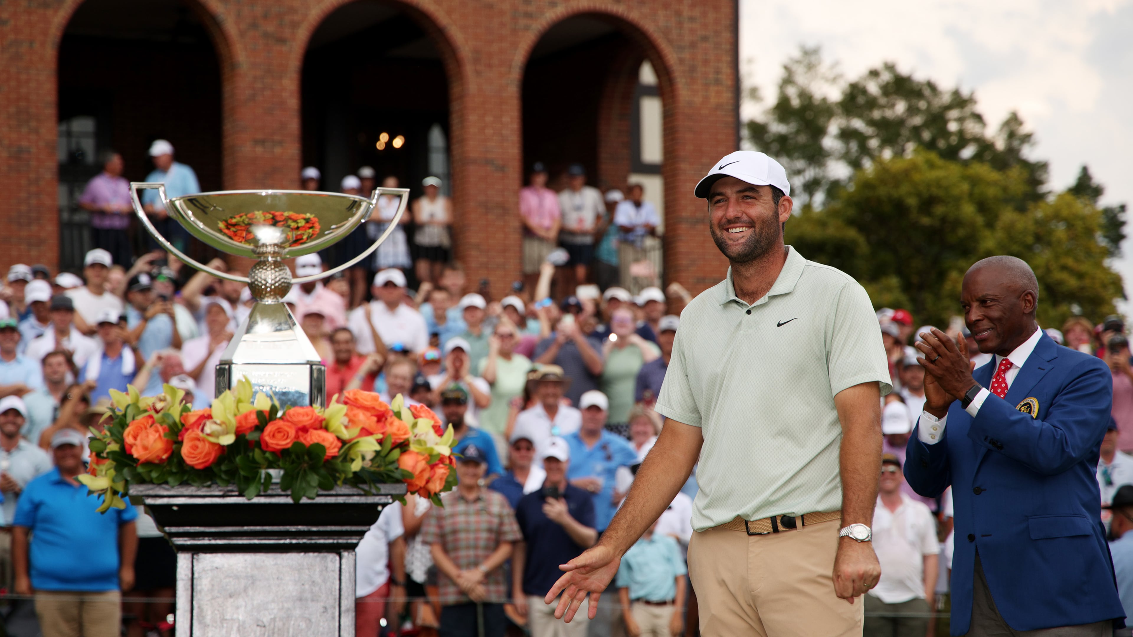 Scottie Scheffler of the United States celebrates with the FedExCup Trophy after winning the FedExCup and TOUR Championship at East Lake Golf Club on Sunday, Sept. 1, 2024, in Atlanta. (Courtesy of Mike Mulholland/Getty Images)