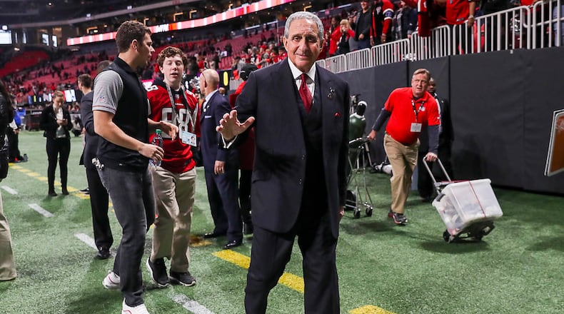 12/16/2018 -- Atlanta, Georgia -- Atlanta Falcons owner Arthur Blank leaves the field following a game against the Arizona Cardinals at Mercedes-Benz Stadium in Atlanta, Sunday, December 16, 2018. The Atlanta Falcons beat the Arizona Cardinals, 40-14. (ALYSSA POINTER/ALYSSA.POINTER@AJC.COM)