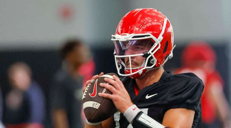 Georgia quarterback Gunner Stockton (14) holds the ball during their first football practice at the University of Georgia practice facility, Wednesday, August 5, 2026, in Athens, Ga. (Miguel Martinez/AJC)