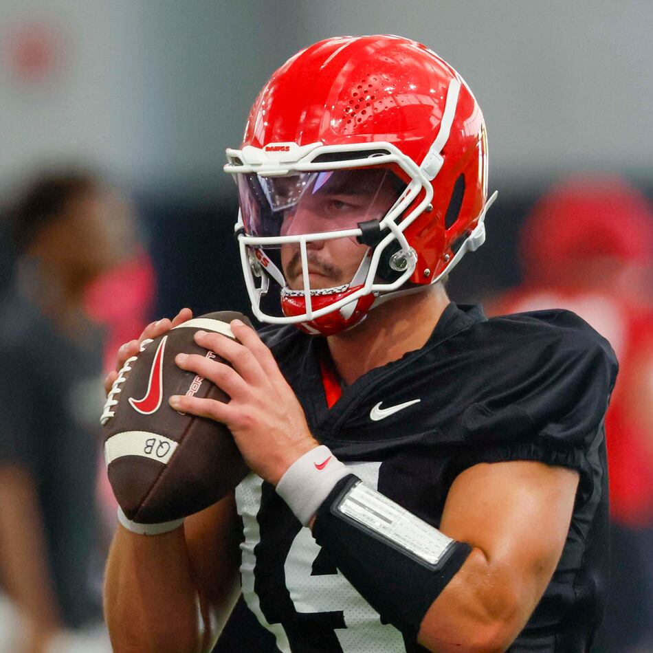 Georgia quarterback Gunner Stockton (14) holds the ball during their first football practice at the University of Georgia practice facility, Wednesday, August 5, 2026, in Athens, Ga. (Miguel Martinez/AJC)
