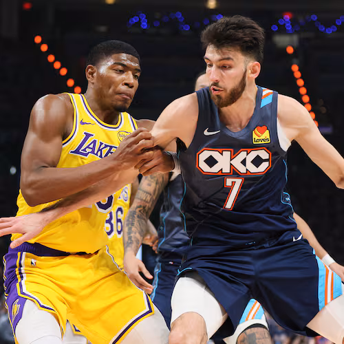 Oklahoma City Thunder center Chet Holmgren (7) works to the basket against Los Angeles Lakers forward Rui Hachimura (28) in the second half of Game 2 in a second-round NBA basketball playoffs series Thursday, May 7, 2026, in Oklahoma City. (AP Photo/Nate Billings)