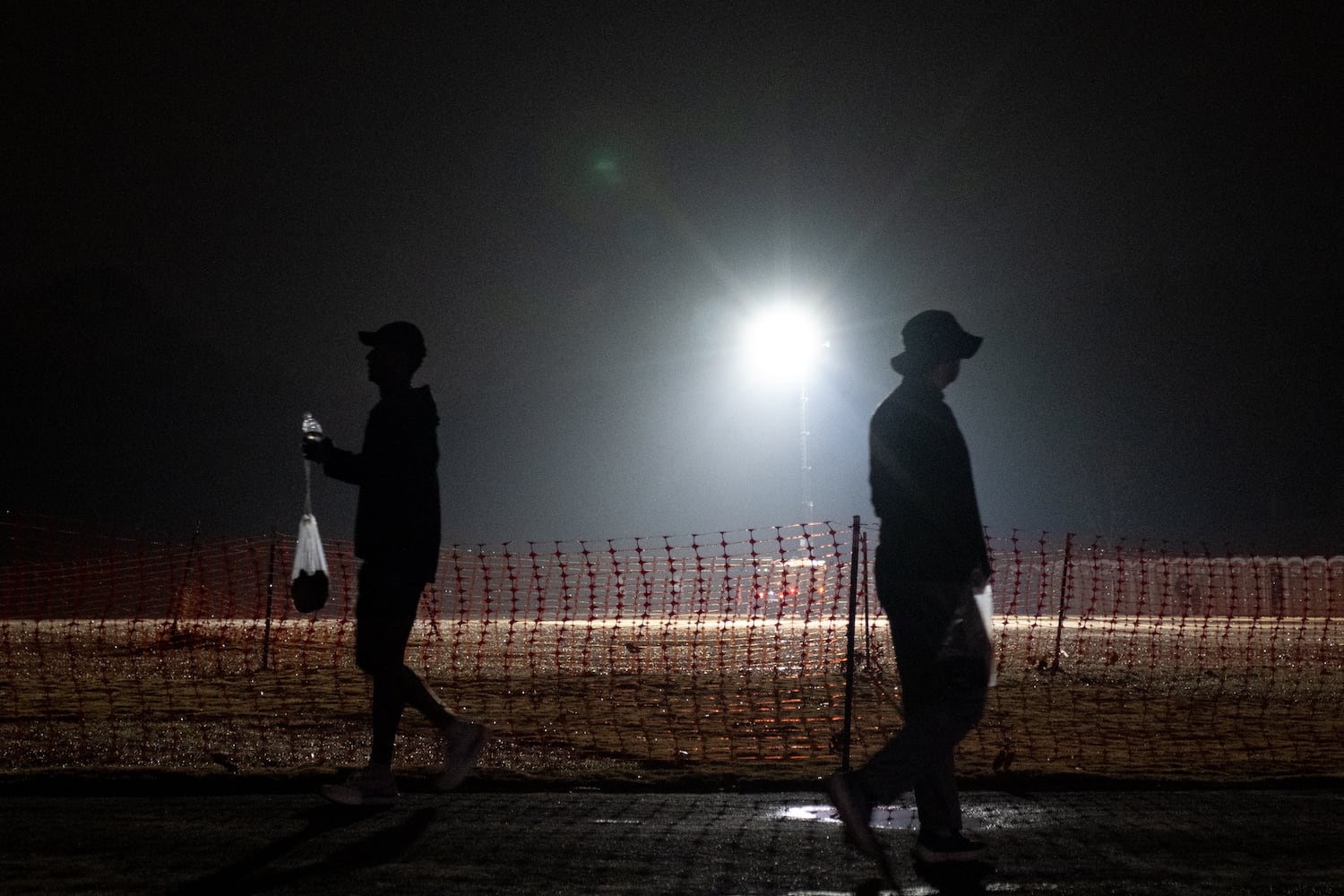Runners walk about before the Polar Opposite Peachtree Road Race on Saturday, Jan. 3, 2026, in Atlanta. (Ben Gray for the AJC)