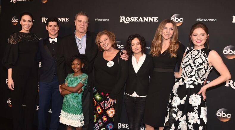 From left, Whitney Cummings, Michael Fishman, John Goodman, Jayden Rey, Roseanne Barr, Sara Gilbert, Sarah Chalke and Emma Kenney attend the premiere of ABC's "Roseanne" at Walt Disney Studio Lot on March 23, 2018 in Burbank, California.