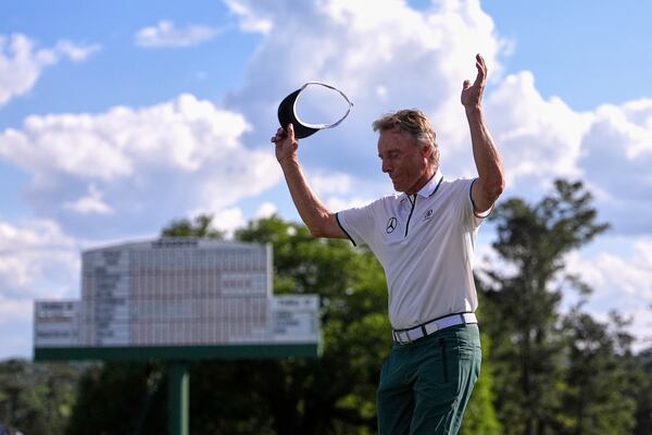 Bernhard Langer, of Germany, waves to the gallery after the second round at the Masters golf tournament, Friday, April 11, 2025, in Augusta, Ga. (AP Photo/George Walker IV)