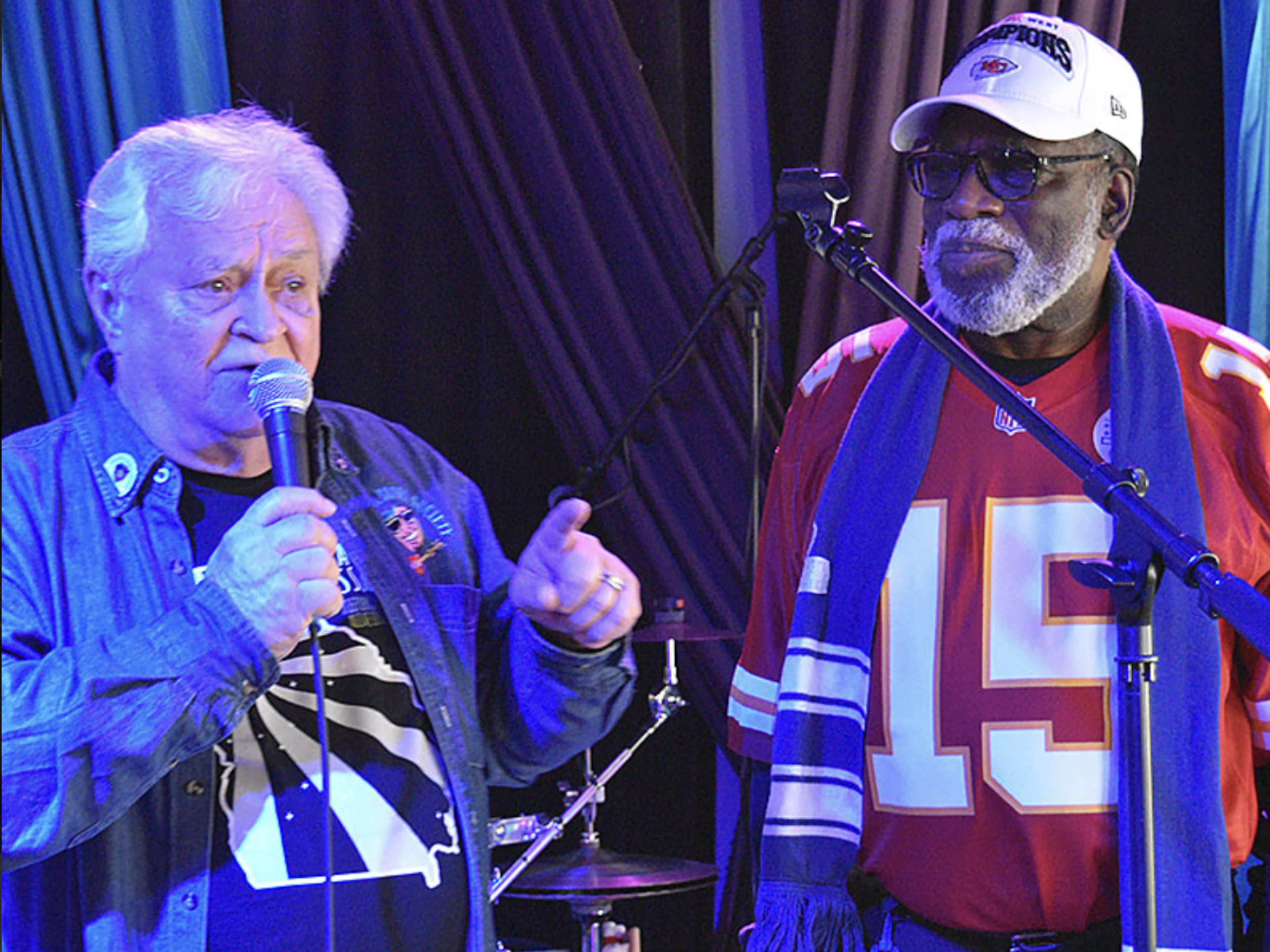 The late George Klein (left), past president of the Atlanta Blues Society, joins Carlin “C-Note” Smith, its current president and founder, on stage. Smith emphasizes that the group’s growth has been driven by both its members and leadership. (Courtesy of Michael Davis)