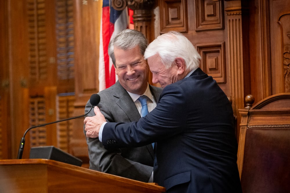 Gov. Brian Kemp and House Speaker Jon Burns, R-Newington, embraced on the final day of the legislative session at the Capitol in Atlanta in April.