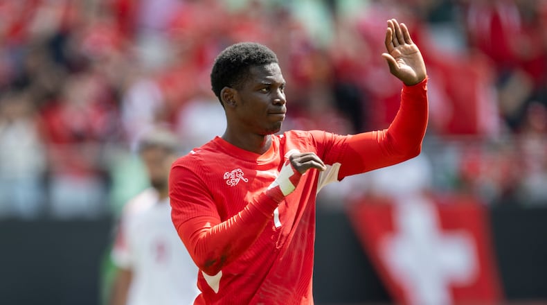 Switzerland's Breel Embolo celebrates scoring during the international friendly soccer match between Switzerland and Jordan in St. Gallen, Switzerland, Sunday, May 31, 2026. (Gian Ehrenzeller/Keystone via AP)