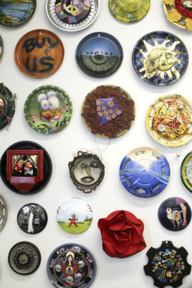 Hubcap art adds vroom to room