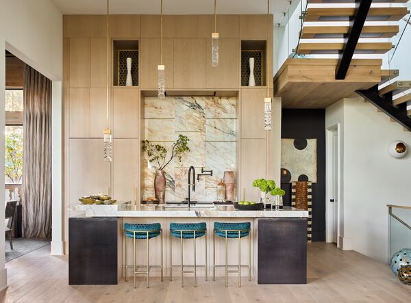 Some home health experts advise using hardwood or tile flooring instead of carpeted flooring to make cleaning easier and your home healthier.
(Courtesy of Intuitive Dwellings by Enwright Design Inc and South Haven Builders / Emily Followill)