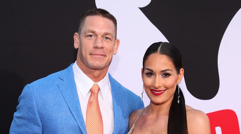 John Cena (L) and Nikki Bella have split up and called off their engagement. (Photo by Christopher Polk/Getty Images)