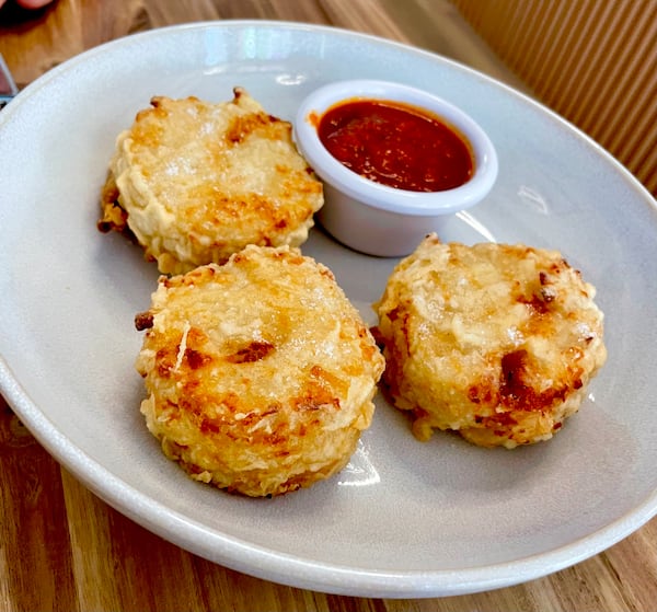 Frittatine cacio and pepe at Nonna Dora. (Angela Hansberger for the AJC)