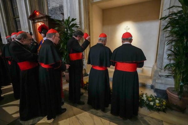 Cardinals visit the tomb of late Pope Francis inside St. Mary Major Basilica in Rome, Sunday, April 27, 2025. (AP Photo/Andrew Medichini)