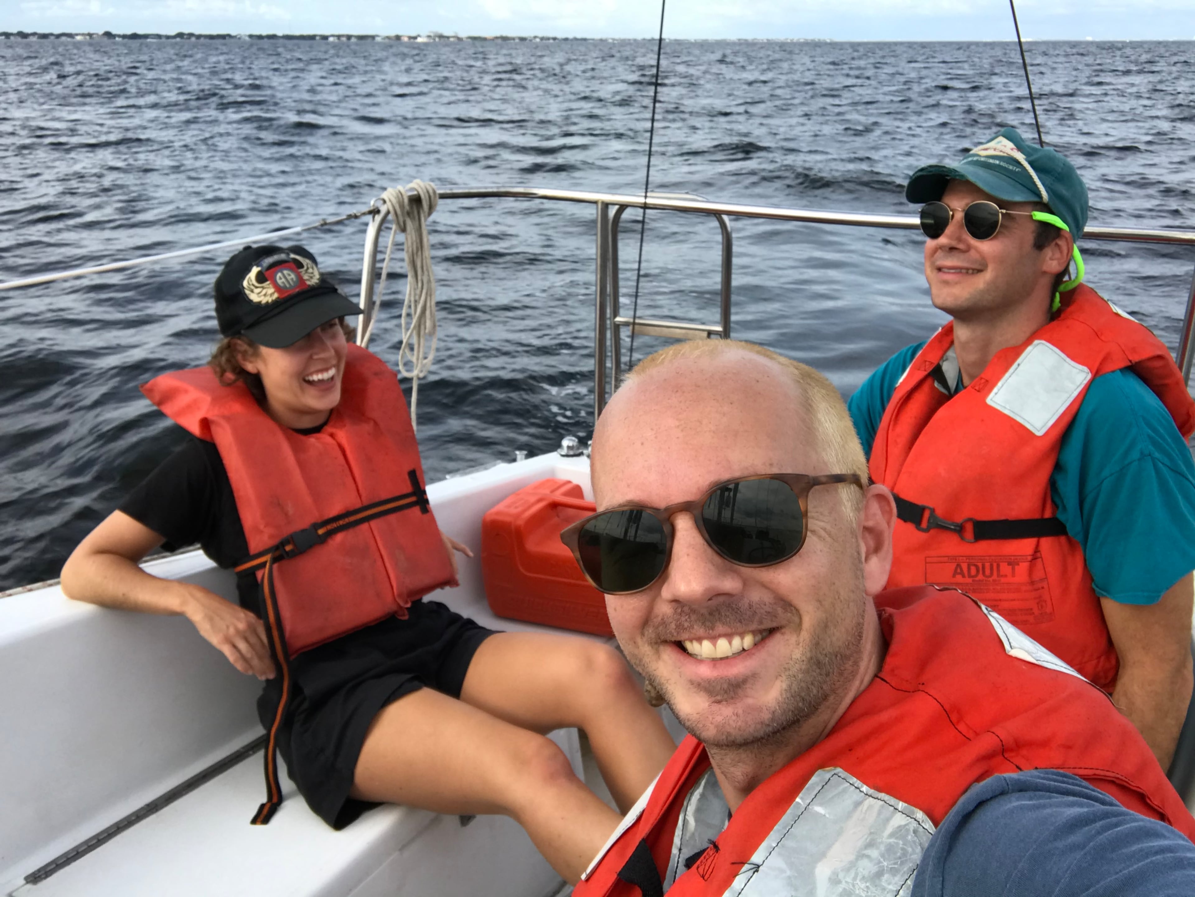 Writer Jodi Cash (left), photographer Ethan Payne (middle) and composer Gresham Cash aboard a boat off the Gulf Coast of Florida during the filming of "The Green Flash." (Courtesy of Jodi Cash)