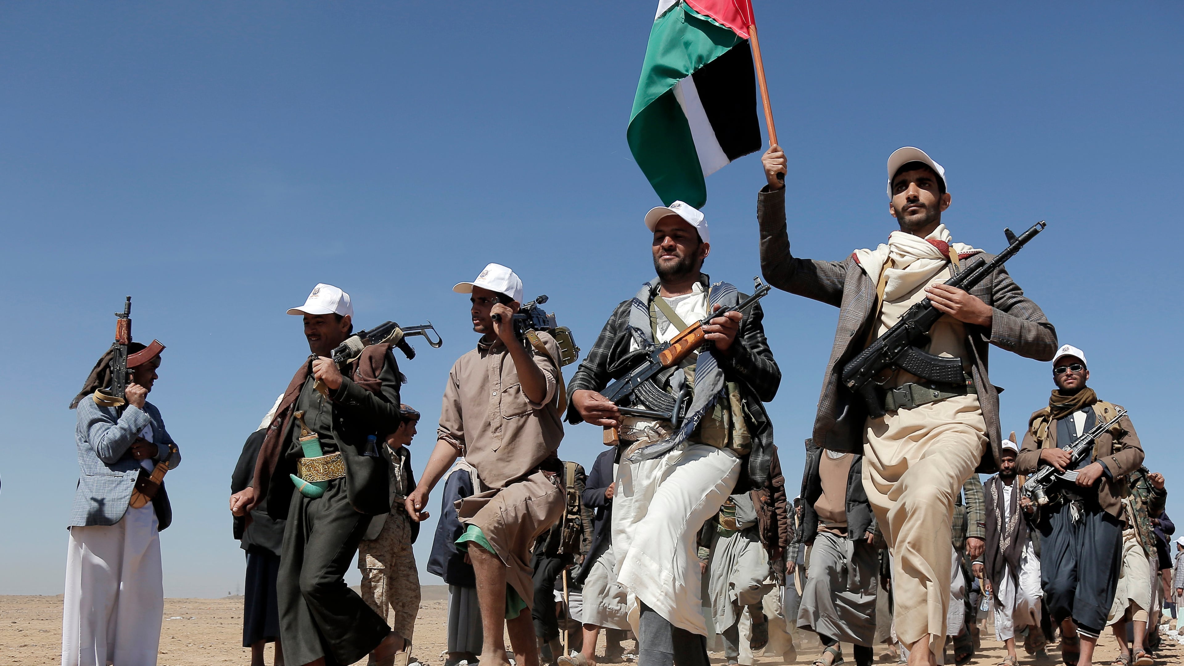 FILE - Houthi fighters march during a rally of support for the Palestinians in the Gaza Strip and against the U.S. strikes on Yemen outside Sanaa on Jan. 22, 2024. (AP Photo, File)