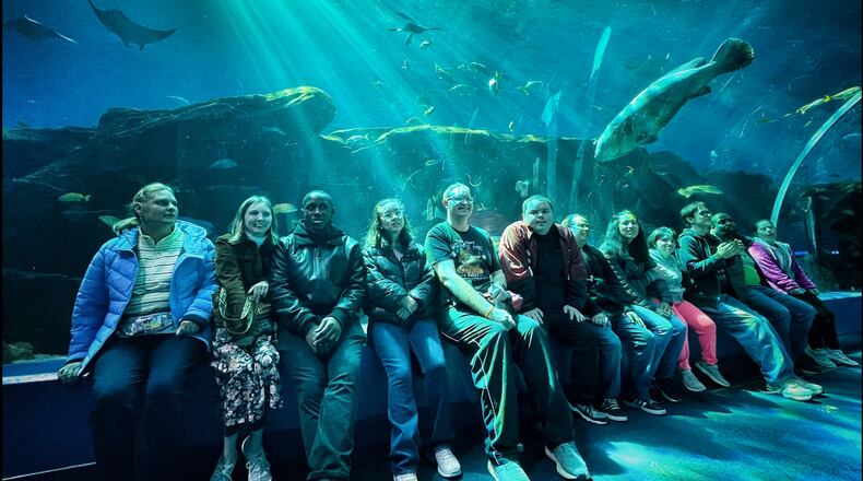 Great Prospects serves adults with special needs. Here participants at a recent visit to the Georgia Aquarium. COURTESY GREAT PROSPECTS