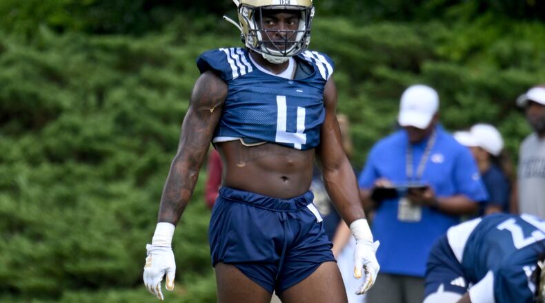 Georgia Tech's linebacker Braelen Oliver (4) warms up during a training camp at Georgia Tech’s Rose Bowl Field, Tuesday, August 1, 2023, in Atlanta. (Hyosub Shin / Hyosub.Shin@ajc.com)