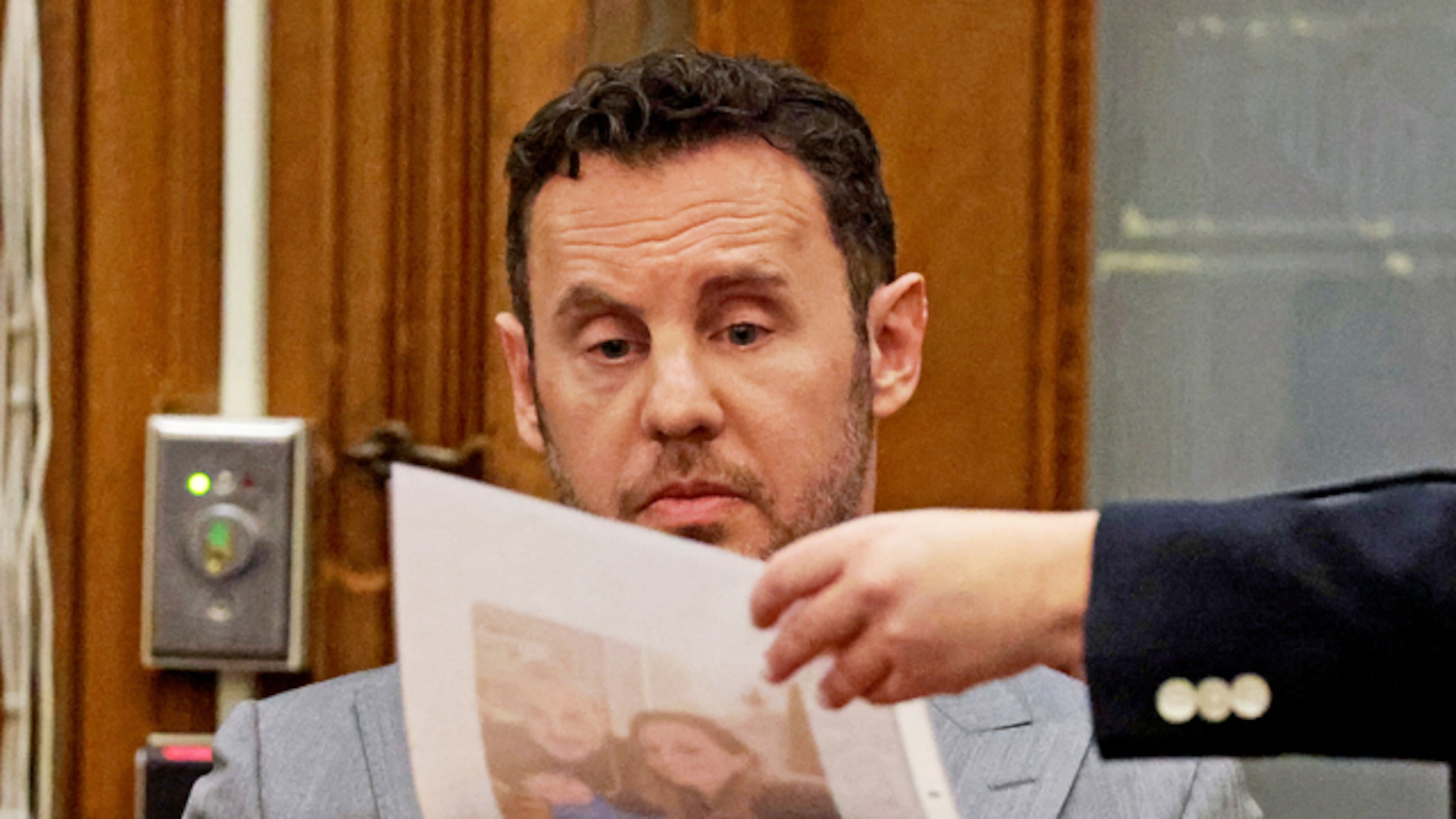 William Fastow, Ana Walshe's boyfriend, looks at a picture of Ana while on the witness stand during Brian Walshe's trial for murdering his wife Ana, Thursday, Dec. 4, 2025, in Dedham, Mass. (Matt Stone/The Boston Herald via AP, Pool)