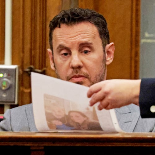 William Fastow, Ana Walshe's boyfriend, looks at a picture of Ana while on the witness stand during Brian Walshe's trial for murdering his wife Ana, Thursday, Dec. 4, 2025, in Dedham, Mass. (Matt Stone/The Boston Herald via AP, Pool)