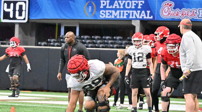 Georgia's defensive lineman Jalen Carter (88) runs a drill during their practice session ahead of the Chick-fil-A Peach Bowl against Ohio State at the Mercedes-Benz Stadium on Wednesday, Dec. 28, 2022, in Atlanta. (Hyosub Shin / Hyosub.Shin@ajc.com)
