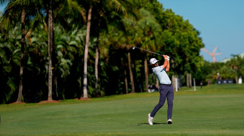 Cameron Young hits from the 14th fairway during the third round of the Cadillac Championship PGA golf tournament Saturday, May 2, 2026, in Doral, Fla. (AP Photo/David J. Phillip)