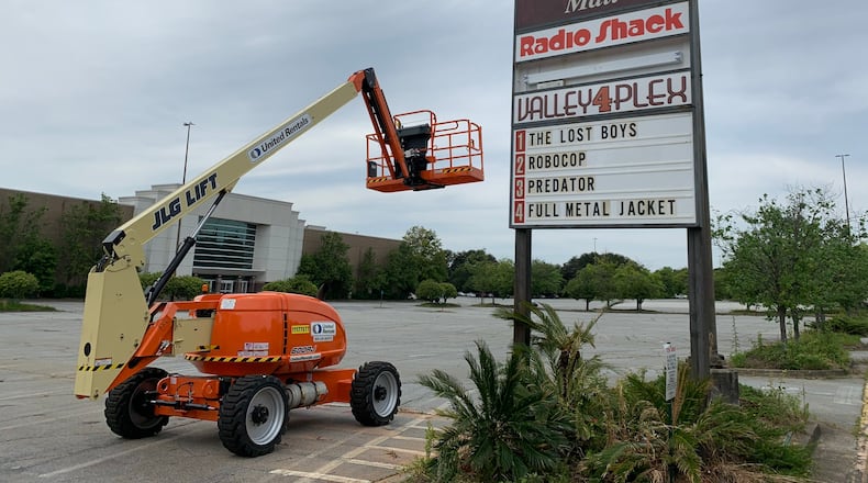 The movie "Secret Headquarters" built a fake mall marquee with films from the summer of 1987. Photo from spring 2021 at Gwinnett Place mall. RODEY HO/rho@ajc.com